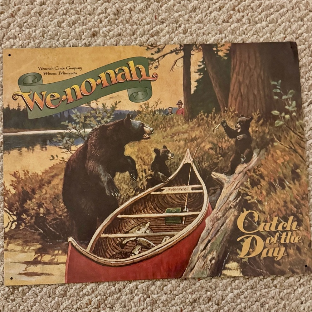 We-no-nah Catch of the Day Tin Sign
Pre-owned.